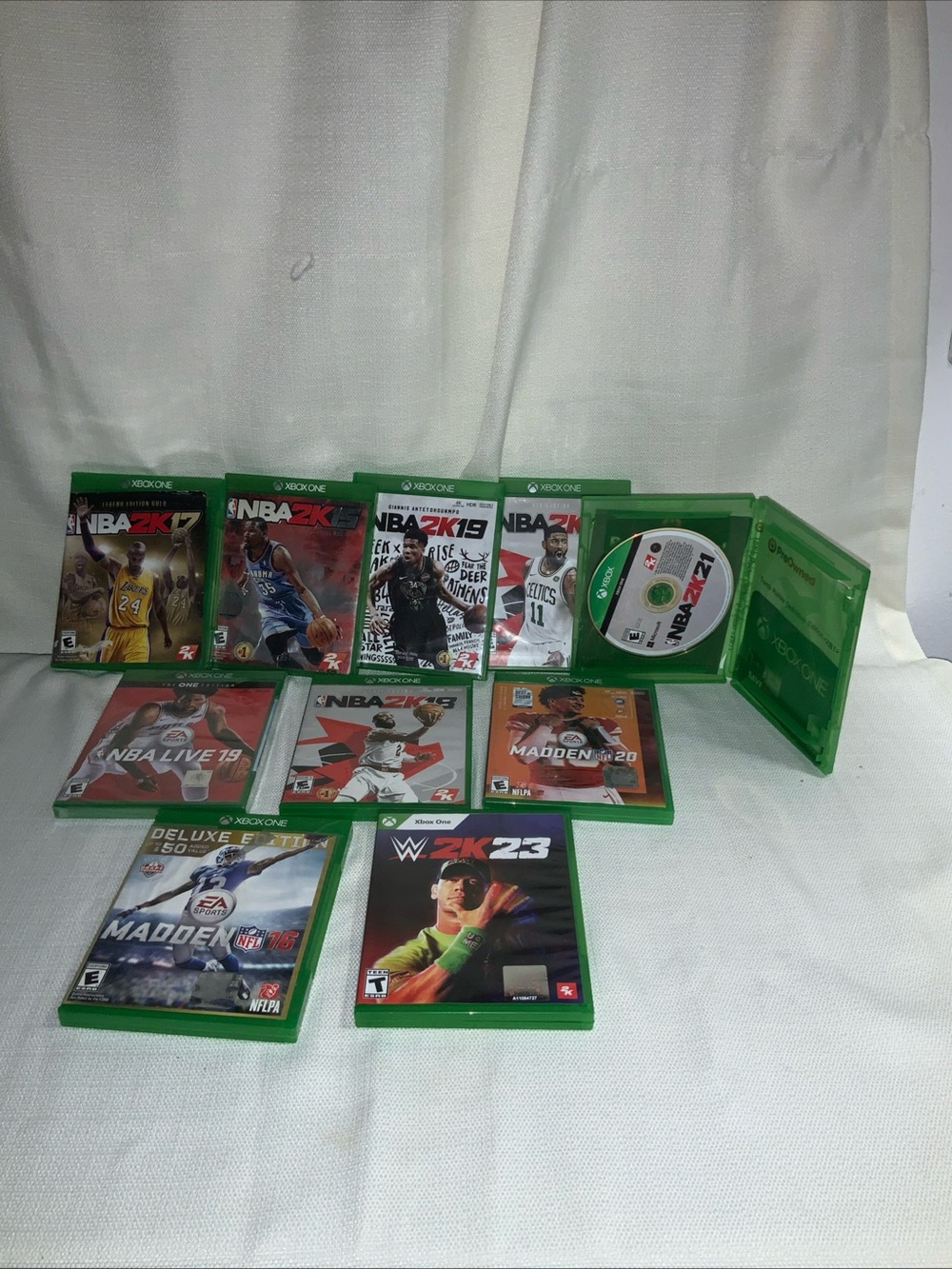 Lots of 10 Xbox one games. One is brand new sealed. Basketball, wrestling etc.